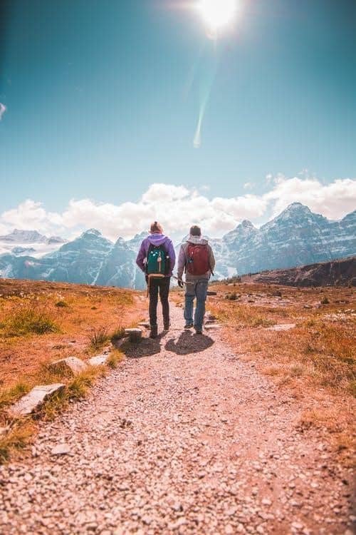 Two people hiking a trail